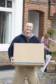 Professional flat removals in Wembley with moving van and boxes
