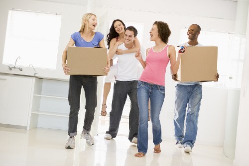 Professional removals team planning a move in Wembley