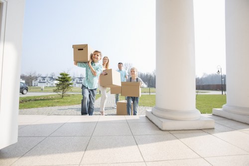 Professional house removals in Wembley with moving van and packed boxes