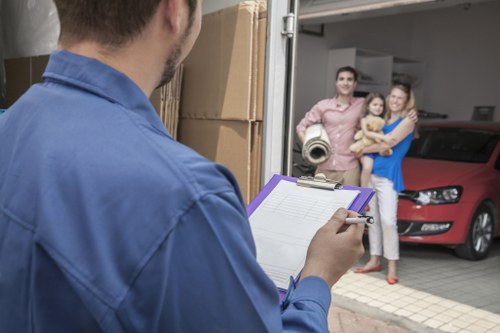Domestic home move with furniture and boxes in Wembley